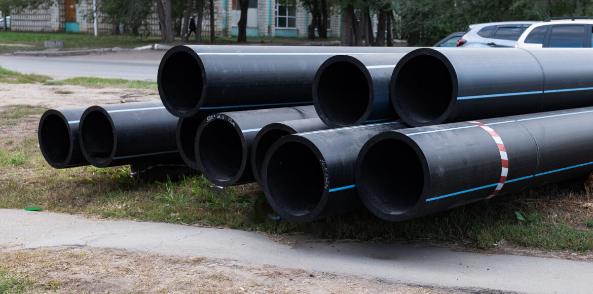 Replacement of sewer pipes. New pipes close-up.