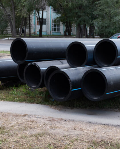 Replacement of sewer pipes. New pipes close-up.