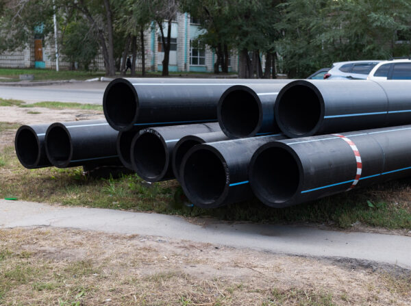 Replacement of sewer pipes. New pipes close-up.