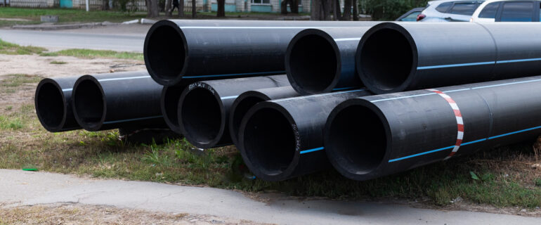 Replacement of sewer pipes. New pipes close-up.